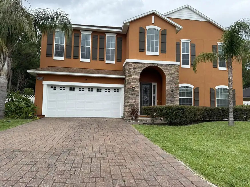 Clean paver driveway after professional pressure washing
