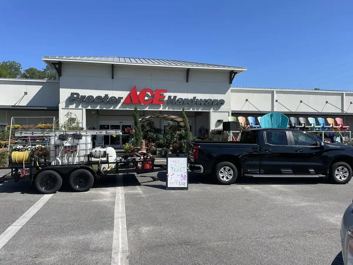 Retail storefront and forecourt with the Cannon pressure washing rig on site
