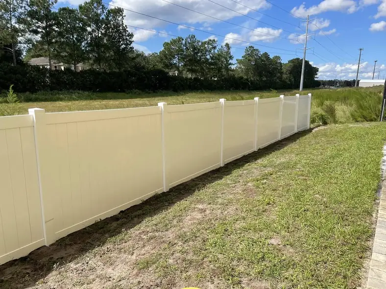 Same vinyl fence clean and bright after soft washing