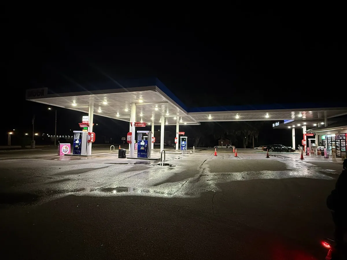 Fuel station forecourt and canopy after an overnight pressure washing service